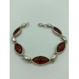 Vintage SILVER and AMBER BRACELET Having the Amber stones set in Marquise shaped mounts.