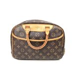 A Louis Vuitton Deauville Bag. Monogram canvas with brown leather. Padlock and key. Four open