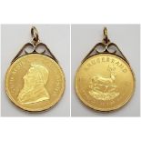 A 1981 22k Krugerrand Coin in a 9K Gold Pendant Casing. Total weight - 37.56g.