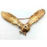 A Fabulous 9K Yellow Gold and Sapphire-Eyed Vintage Owl Brooch. In mid-swoop! 7cm wingspan. 9.93g