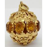 A Glorious Edwardian Possibly Victorian 18K Gold Citrine Bauble Pendant. Nine quality oval cut