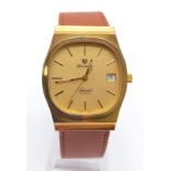 A Vintage Nivada Gold Plated Antarctic Gents watch. Brown leather strap. Two tone case - 32mm.
