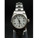 A Rolex Oyster Perpetual Datejust Ladies Watch. Stainless steel strap and case - 26mm. White dial