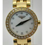 AN 18K GOLD LADIES LONGINE WRIST WATCH WITH DIAMOND BEZEL AND NUMERALS,QUARTZ MOVEMENT IN ORIGINAL