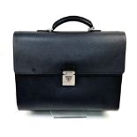 A Stylish Louis Vuitton Robusto Black Taiga Leather Briefcase. LV silver tone lock - no key.