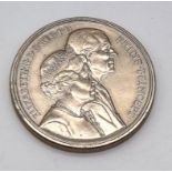 An Elizabeth and Phillip Fiftieth Wedding Anniversary Five Pound Coin.