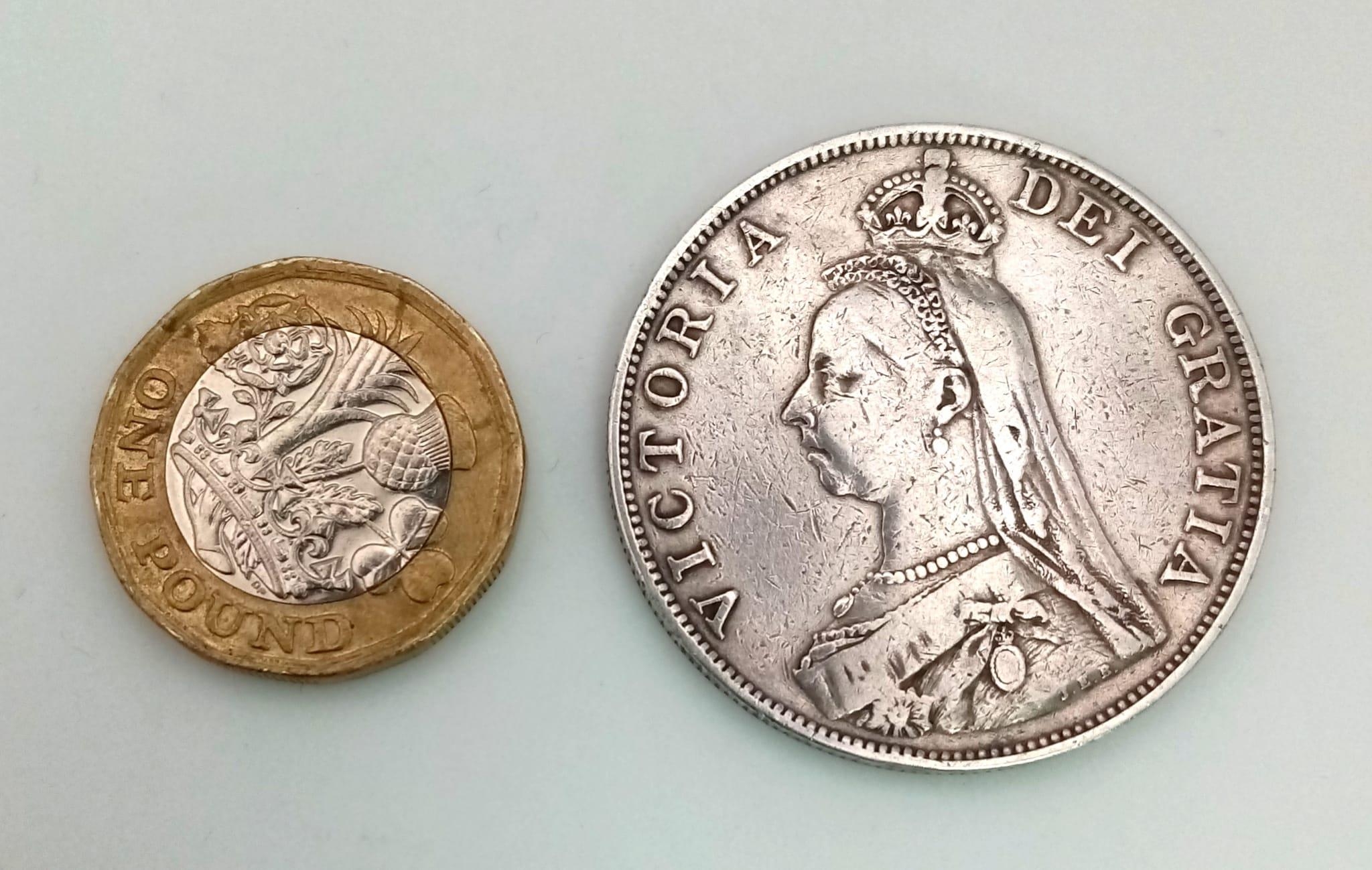 An 1890 Queen Victoria Double Florin Silver Coin. Good definition but please see photos. - Image 4 of 4