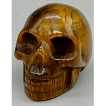 A Tigers Eye Skull Figure. 6cm.