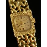 Vintage ACCURIST ladies wristwatch in gold tone having square face with an absolutely stunning