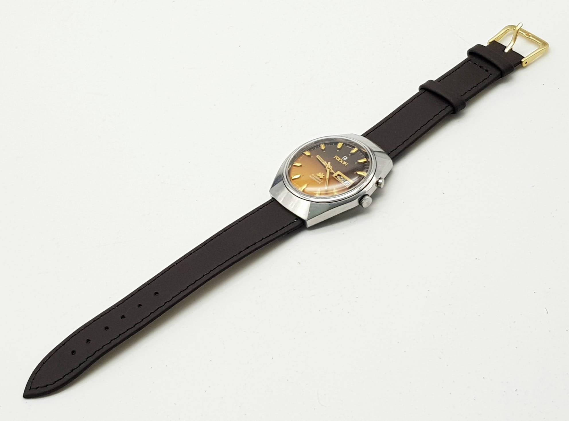 A Vintage Ricoh 21 Jewel Automatic Gents Watch. Brown leather strap with golden brown dial. - Image 5 of 5
