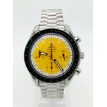 AN OMEGA SPEEDMASTER AUTOMATIC (THE MICHAEL SCHUMACHER RACING EDITION) 3 SUB DIALS AND YELLOW SPLASH