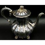 An Antique Roberts and Belk Silver Plate Tea Pot. Wonderful pumpkin body design with an ornate