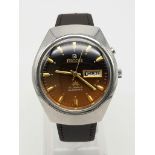 A Vintage Ricoh 21 Jewel Automatic Gents Watch. Brown leather strap with golden brown dial.