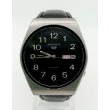 A Vintage Seiko 5 Automatic Gents Watch. Black leather strap. Stainless steel case - 36mm. Black