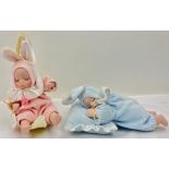 A Pair of Musical Porcelain Baby Dolls, Both are manual winders and play a relaxing lullaby, Moon