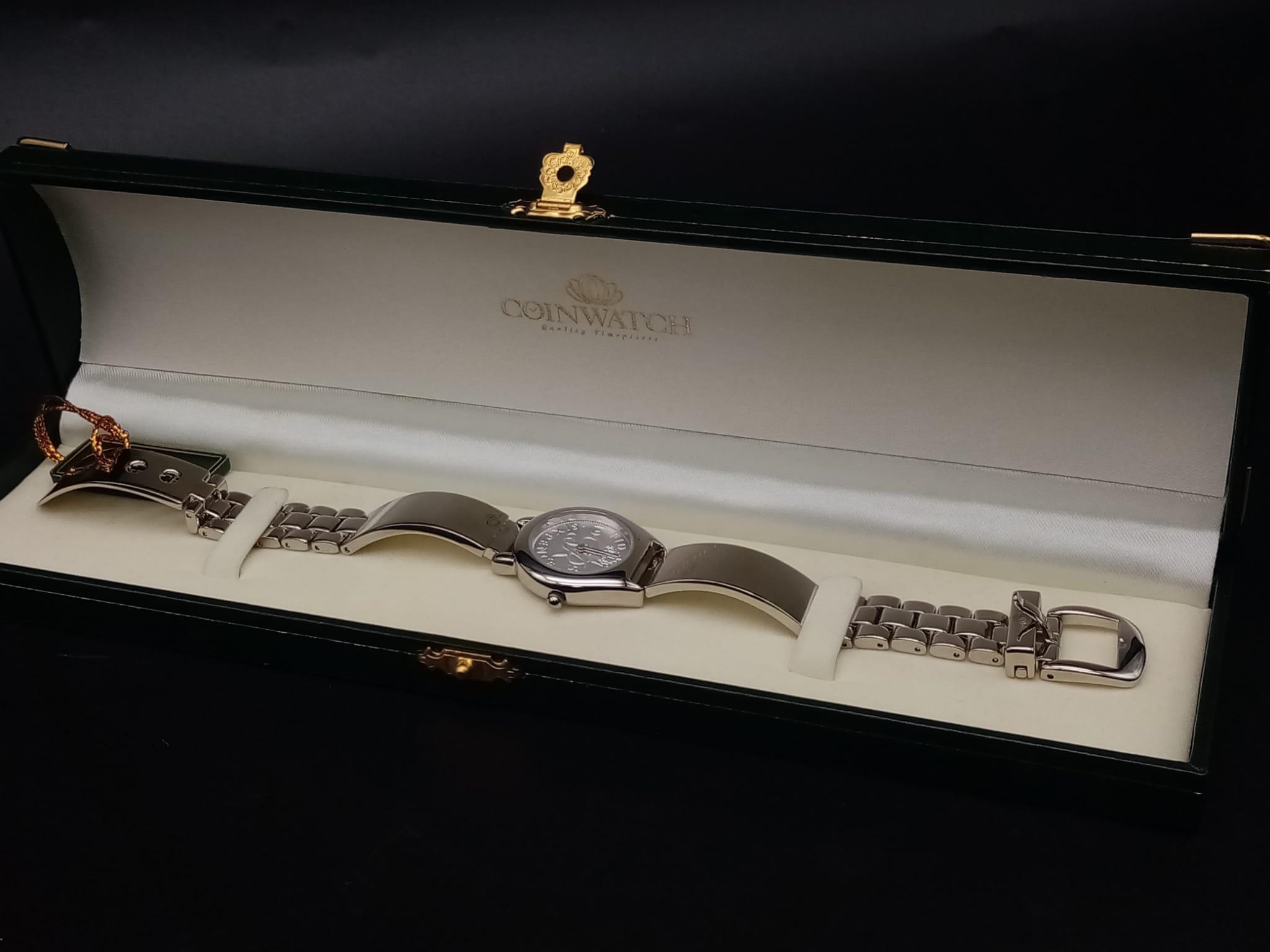 A ladies COIN WATCH in original presentation box. 25 mm case, stainless steel construction, in new/ - Image 11 of 12