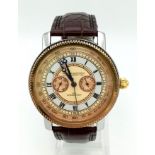 A Geo Chatterton Gents Watch. Brown leather strap (broken). Two tone case - 45mm. Three tone dial
