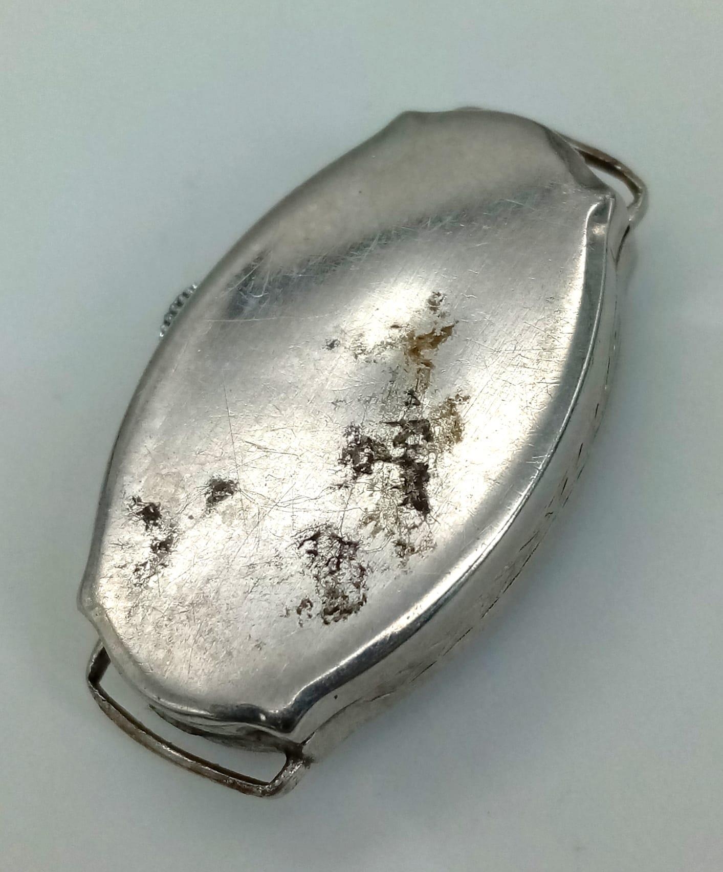 A vintage, 14K white gold ladies watch. Oval case 27 x 16 mm, with gold tone hands. - Image 3 of 3