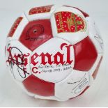 An Arsenal FC 1999-2000 Signed Football. Signatures include Bergkamp, Adams, Keown, Dixon and
