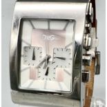 A D&G stainless steel watch with original white leather strap. Case 47 x 32 mm, multi-dial face, 5