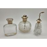 Three Wonderful Antique Glass and Silver Topped Perfume Bottles. All with their own distinctive