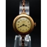 An Antique 9K Rose Gold Benson Ladies Watch. 9K rose gold bracelet and case - 26mm. Mechanical