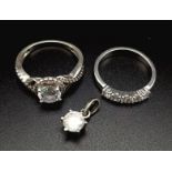 STERLING SILVER SET OF 2 STONE SET RINGS SIZES N & Q PLUS A STERLING SILVER STONE SET SOLITAIRE