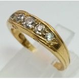 An 18K Yellow Gold Five Stone Diamond Ring. Five graduating round cut bright white diamonds. Size