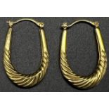 A Pair of 9K Yellow Gold Horse-Shoe Hoop Earrings. 1.82g total weight.