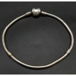 A Silver 925 Pandora bracelet with heart clasp. 21cm. Ref: 19