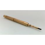 A yellow metal vintage telescopic pencil. Ref: 25