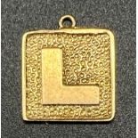 An 9K Yellow Gold Learner Plate! Pendant or Charm. 2cm. 0.95g