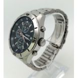 A Seiko Chronograph Quartz Gents Watch. Stainless steel strap and case - 42mm. Black dial with three