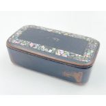 An Antique Papier Mache Snuff Box with Mother of Pearl Inlay. 2 x7cm.