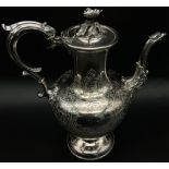 An Antique Ornate Elkington and Co Silver Plate Coffee Pot. Scroll engraving on body with a birds