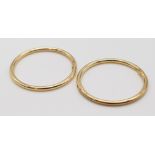 A 9 K yellow gold mini hoop sleeper earrings, weight: 0.9 g.