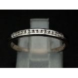 18k white gold channel set diamond half eternity ring 1.8g Size M (dia:0.15ct)