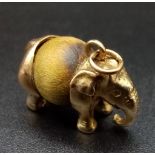 A 9K Yellow Gold and Tigers Eye Elephant Pendant/Charm. 5.47g total weight.