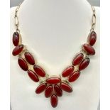 A Vintage 925 Silver and Garnet Necklace. Oval garnet beads. 44cm.