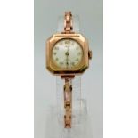 A Vintage 9K Rose Gold Acme Ladies Watch. 9K gold expandable strap and case - 22mm. White dial