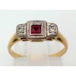 A vintage, 18 k yellow gold and platinum diamond and ruby ring. Size: J, weight: 2.2 g.
