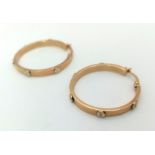 9k yellow gold Cartier style hoop earrings. Total Weight 2.6g
