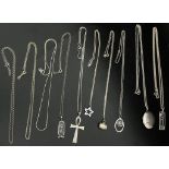 A Selection of 10 Silver Necklaces, Some with Pendants. Total Weight 61.50grams