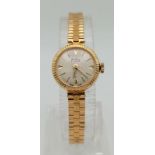 A Vintage 9K Yellow Gold Bentina Star Ladies Watch. Solid 9k gold strap and case - 17mm.