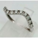 18k white gold wave shaped half eternity ring set with 11 CZ stones, Total Weight 1.2g, size M