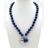 A Lapis Lazuli Necklace with a Lapis Lazuli Elephant Pendant. Elephant - 4cm. Beads - 10mm. Necklace