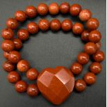 An Expandable Double Row Red Jasper Heart Bracelet. Comes with a certificate.