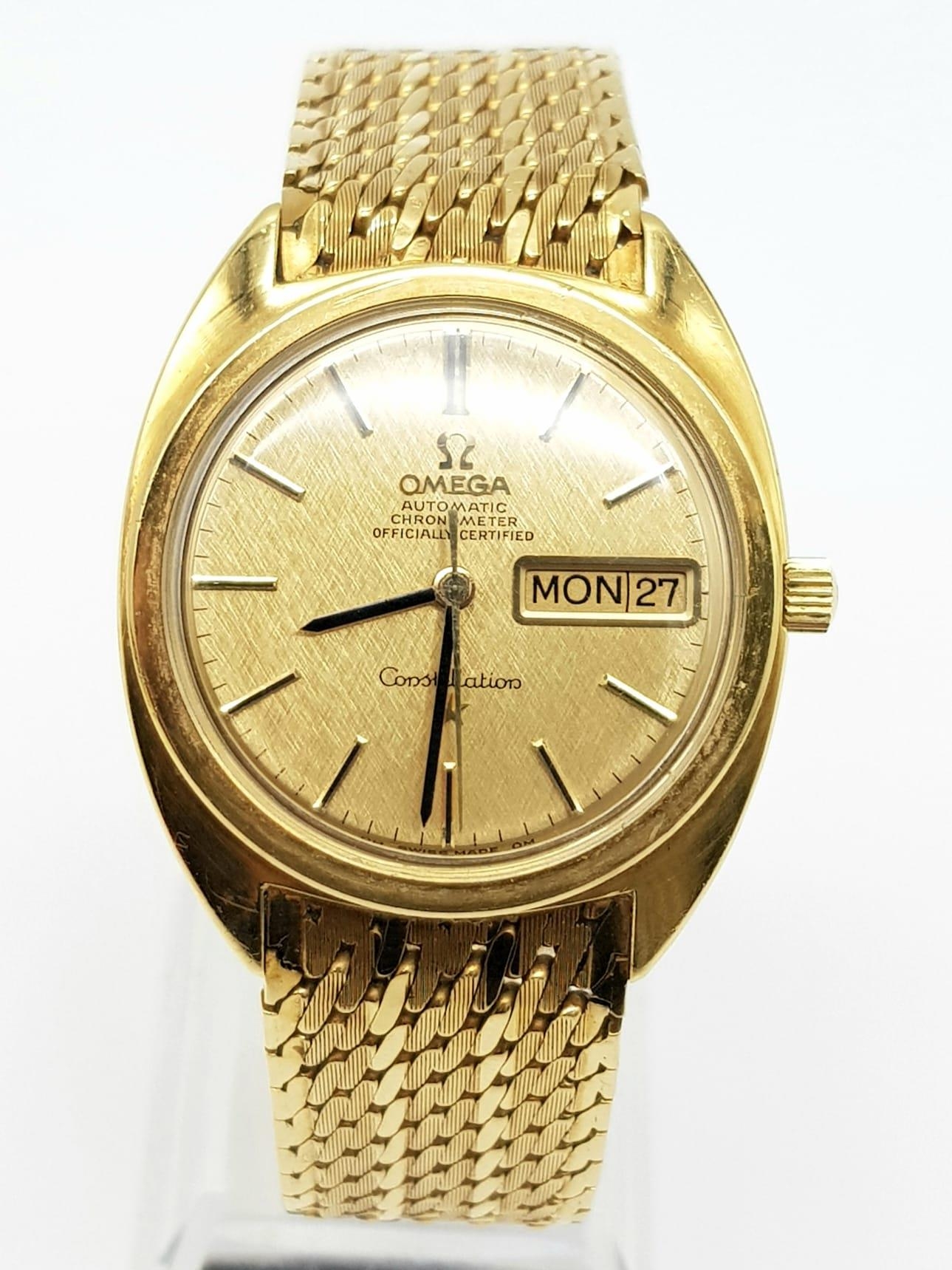 A Vintage 18K Solid Gold Omega Constellation Automatic Gents watch. Solid gold strap and case -