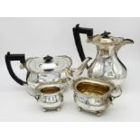 A Henry Matthews Sterling Silver Four Piece Tea Set. To include Teapot, Coffeepot, Cream jug and
