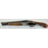 A Deactivated Cosmos Sawn-Off Shotgun. This Spanish 12 bore has hard textured wood with a 13 inch